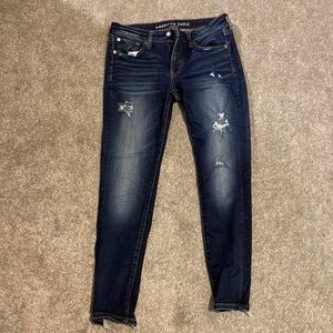 American Eagle dark wash with rips skinny jeans
